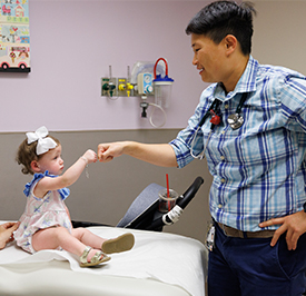 fellowship trainee with patient