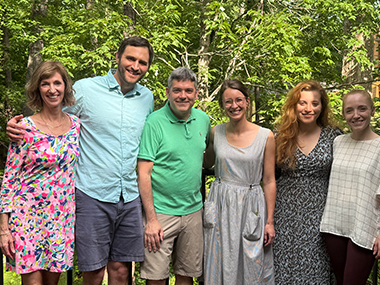 The 2025 ID graduates with faculty outside
