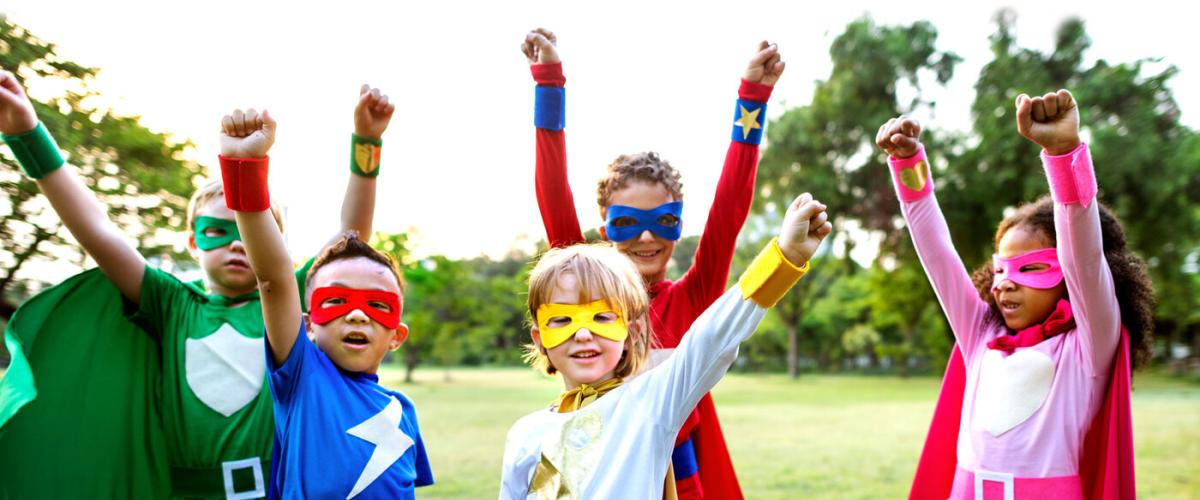 Kids in superhero costumes