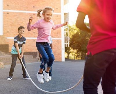 Children skipping rope