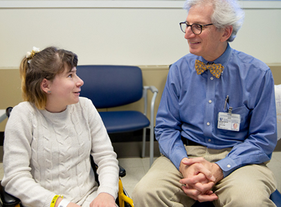 patient and doctor at spina bifida clinic