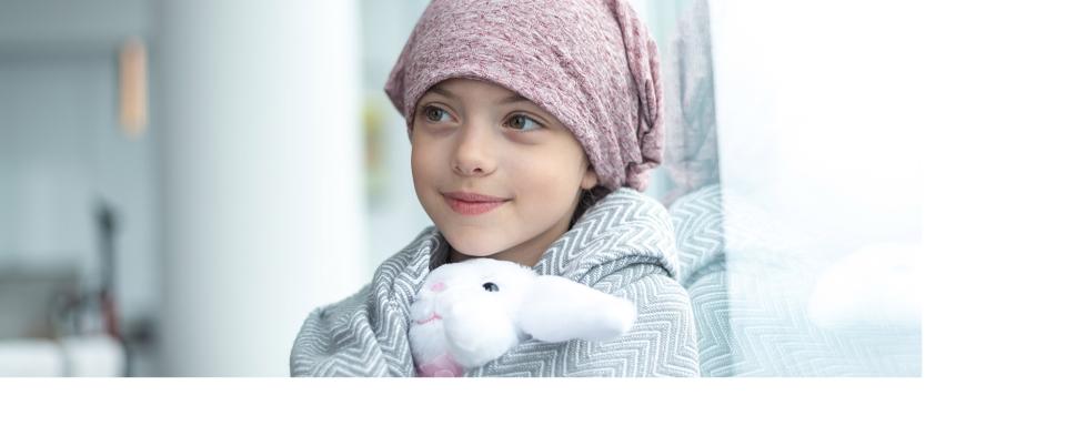 Young girl with stuffed animal
