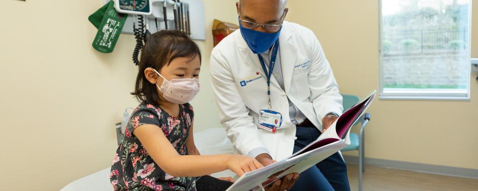 Doctor with pediatric patient